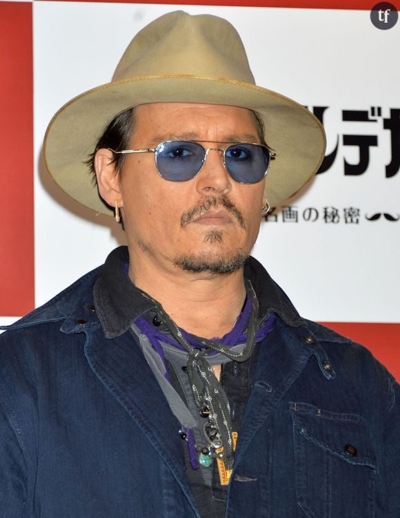 Johnny Depp lors du photocall du film "Charlie Mortdecai" à Tokyo, le 28 janvier 2015.