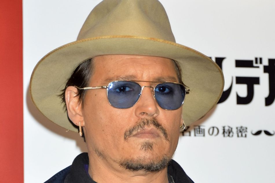 Johnny Depp lors du photocall du film "Charlie Mortdecai" à Tokyo, le 28 janvier 2015.