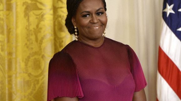 "Pas prêts" : Michelle Obama a dû lisser ses cheveux pour plaire aux Américains