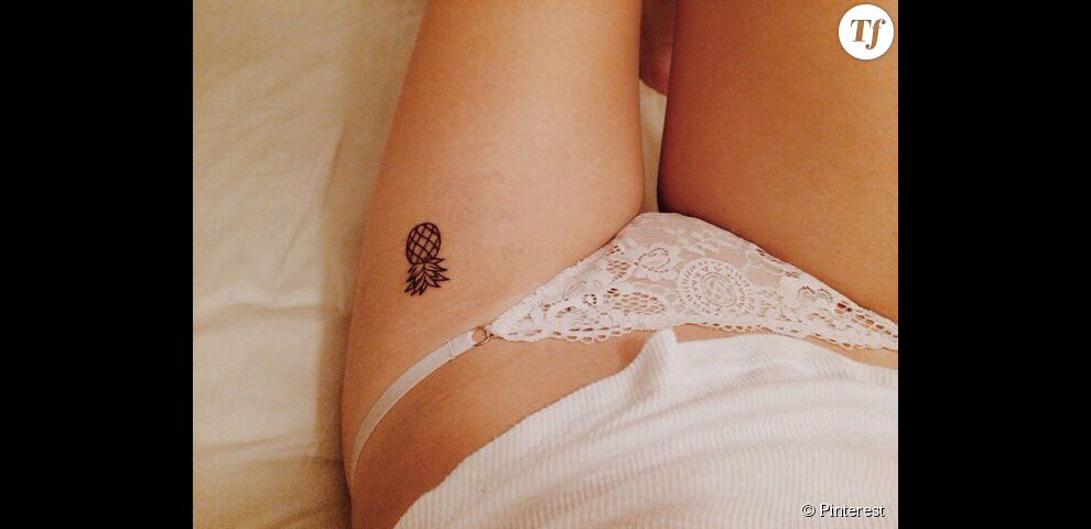 Idée de tatouage sur le haut de la cuisse : un ananas