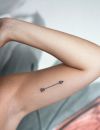 Un tatouage à l'intérieur du bras : une flèche
