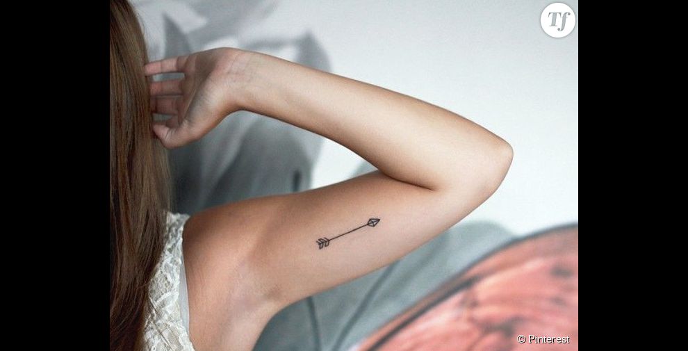 Un tatouage à l&#039;intérieur du bras : une flèche