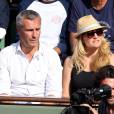  Yann Delaigue et sa compagne Astrid Bard - People dans les tribunes des Internationaux de France de tennis de Roland Garros le 3 juin 2015.  