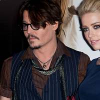 Johnny Depp et Amber Heard en couple au concert des Rolling Stones 