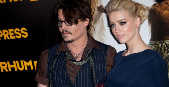 Johnny Depp et Amber Heard en couple au concert des Rolling Stones 
