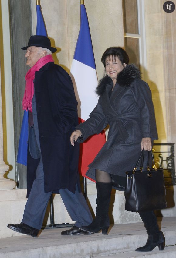  Pierre Nora et Anne Sinclair arrivent au Palais de l'Elysee a Paris le 9 decembre 2013. L'historien Pierre Nora a ete decore Grand officier de la Legion d'honneur par le president Francois Hollande. 