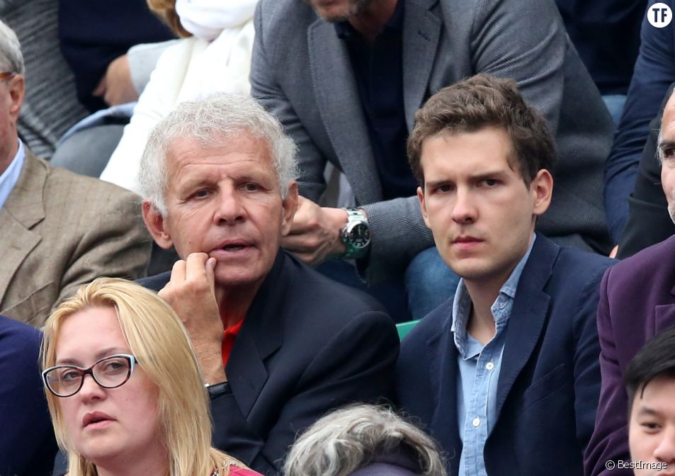 Patrick Poivre d'Arvor et son fils François dans les tribunes de la finale de Roland Garros le 5 juin 2016