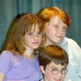  Emma Watson, Daniel Radcliffe, Rupert Grint à une conférence de presse à Londres le 24 novembre 2000. 