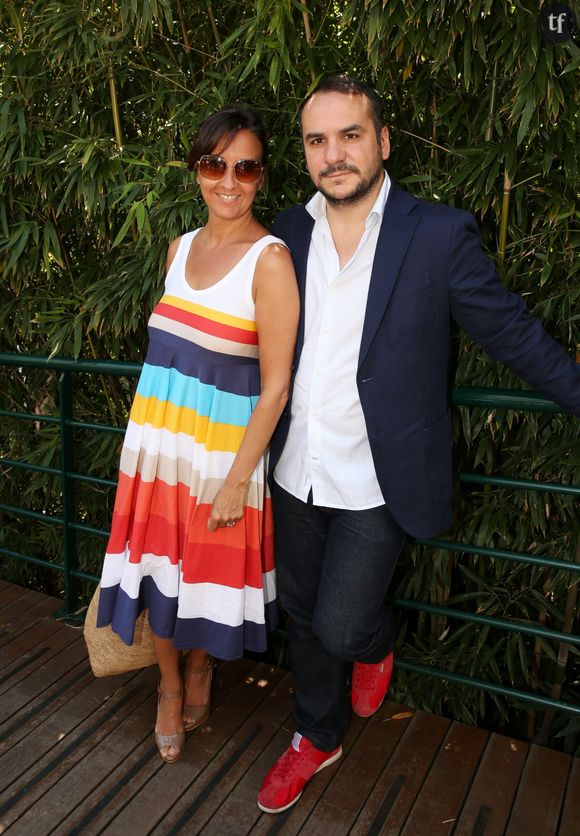 Francois-Xavier Demaison et sa femme Emmanuelle - Jour 13 - People au village lors des Internationaux de France de tennis de Roland Garros le 7 juin 2013. 