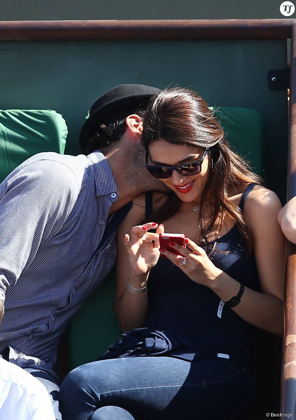  Sofia Essaïdi et son compagnon Adrien Galo - People dans les tribunes de Roland Garros lors de la Coupe Davis. Le 12 septembre 2014  