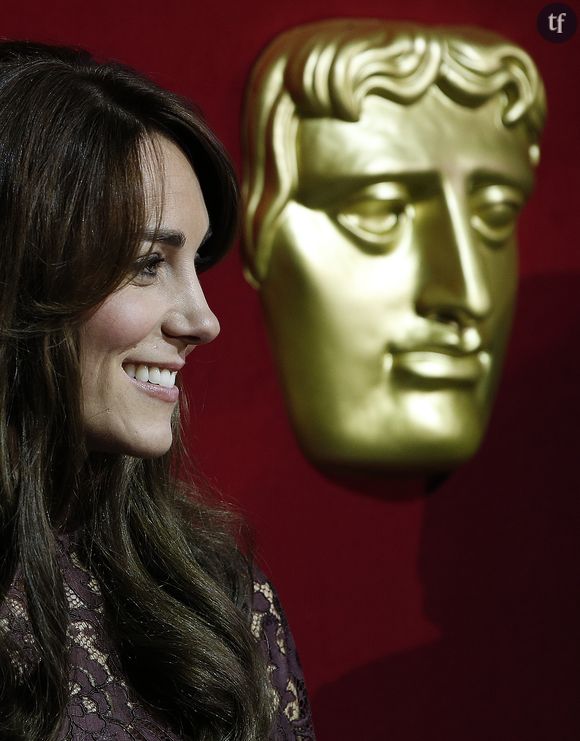 Le président chinois Xi Jinping, accompagné de Catherine Kate Middleton, duchesse de Cambridge et du prince William, assiste à une présentation des BAFTA (British Academy of Film and Television Arts) à la Lancaster House à Londres le 21 octobre 2015. 