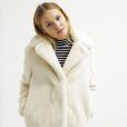 Fausse fourrure : 10 manteaux chic (et pas chers) pour passer l'hiver au chaud.    Manteau Blanc en fausse fourrure Topshop 87 euros    