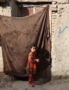Une fillette dans un campd de réfugié·es à Kaboul, Afghanistan, 2021