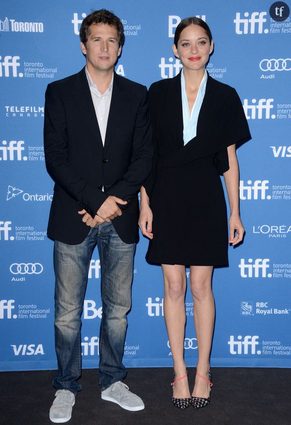 Guillaume Canet et Marion Cotillard assistent au photocall de The Blood Ties lors du Festival international du film de Toronto 2013 à Toronto, ON, Canda, le 10 septembre 2013