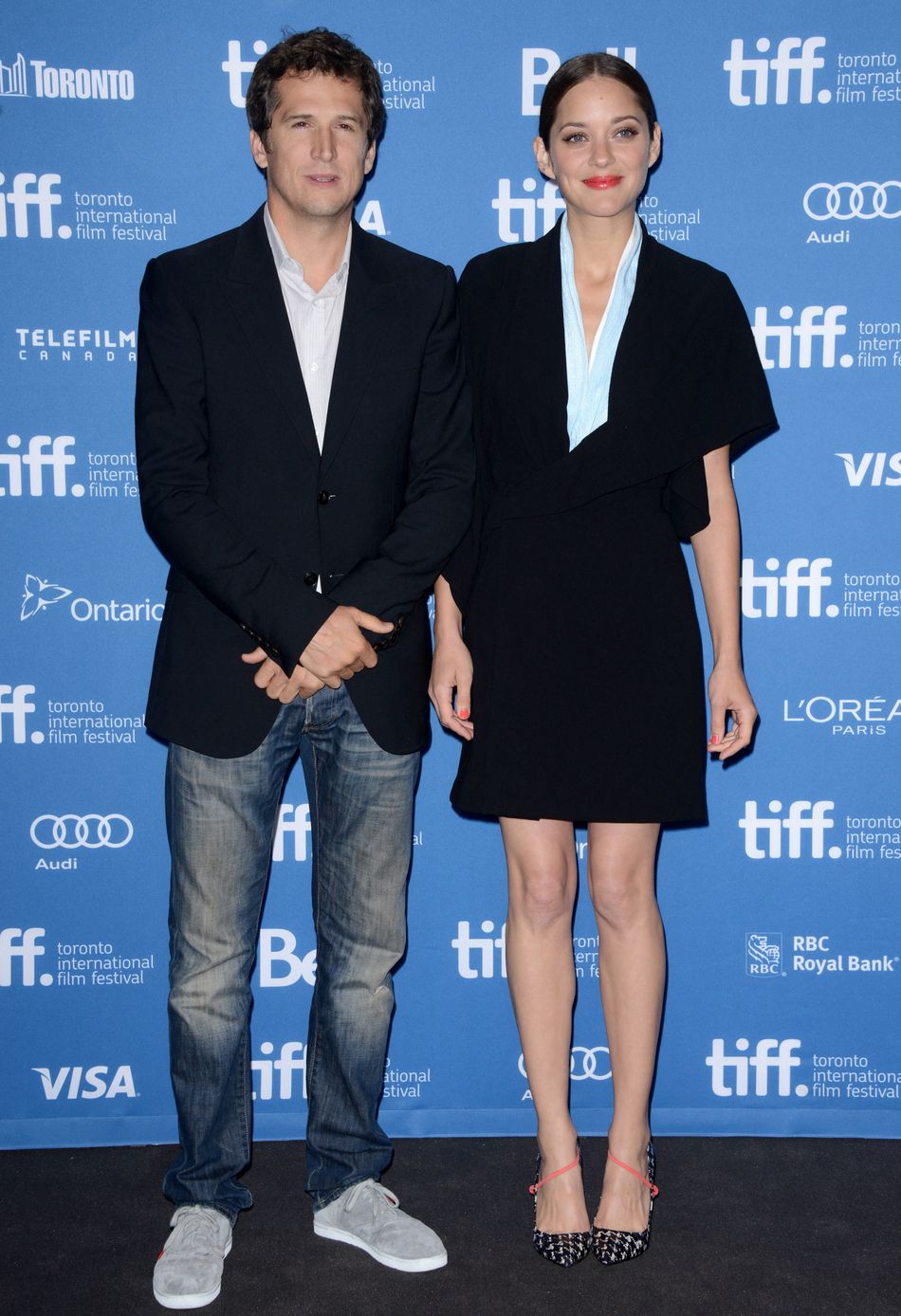 Guillaume Canet et Marion Cotillard assistent au photocall de The Blood Ties lors du Festival international du film de Toronto 2013 à Toronto, ON, Canda, le 10 septembre 2013