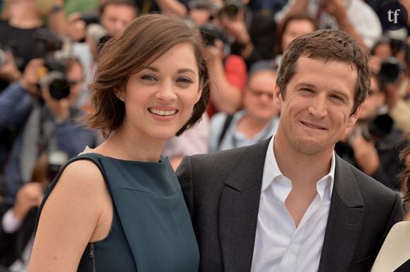 Marion Cotillard et Guillaume Canet posant au photocall Blood Ties tenu au Palais des Festivals dans le cadre du 66ème Festival de Cannes à Cannes, le 20 mai 2013.