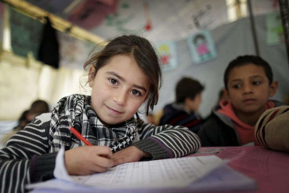 Une fille syrienne dans une école provisoire à Zahle au Liban en 2014