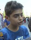 Le jeune migrant syrien Kinan Masalmeh appelle à la fin de la guerre