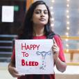 Une femme soutient la campagne #HappyToBleed