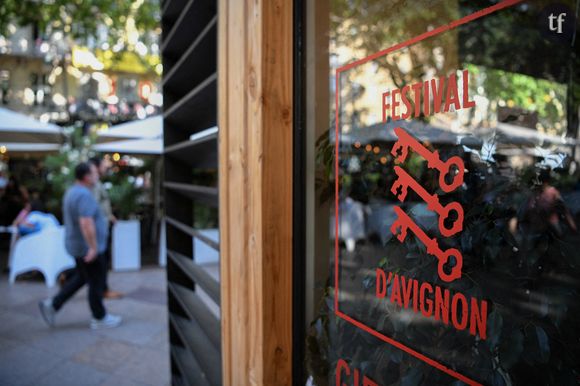 Insultes, menaces, agressions : au Festival d'Avignon, le racisme bouscule les représentations du spectacle afroféministe de Rebecca Chaillon 
A man walks past a gift shop of the Festival d'Avignon. The Festival d'Avignon has started in France, offering a month-long celebration of theatre in the medieval city. Held in the center of Avignon, this 77th edition features a diverse program of performances. Photo by Igor Ferreira/SOPA Images/SPUS/ABACAPRESS.COM