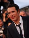  L'acteur devrait " jugé au début de l'année 2024 pour agression sexuelle en état d'ivresse manifestes " selon le Parquet de Paris. Il pourrait encourir jusqu'à " 5 ans d'emprisonnement et 75 000 euros d'amende ". 
 (Légende : Nicolas Bedos attend la projection de son film "Mascarade" durant le 75e Festival de Cannes, le 22 mai 2022). 