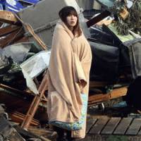Le Japon rend hommage aux victimes un mois après la catastrophe