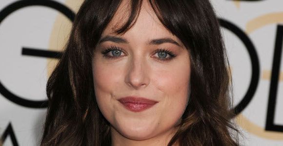 Fifty Shades of Grey : une photo de Dakota Johnson jeune et très tatouée