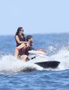  L'actrice Nina Dobrev et son nouveau compagnon Austin Stowell font du jet ski à Saint-Tropez le 24 juillet 2015.  