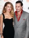   Amber Heard et son mari Johnny Depp - Avant-première du film "Black Mass" lors du Festival International du film de Toronto, le 14 septembre 2015.  