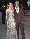   Johnny Depp (habillé en Ralph Lauren) et sa compagne Amber Heard (robe Elie Saab) - Première du film "The Danish Girl" au festival International du film de Toronto (TIFF) le 12 septembre 2015  