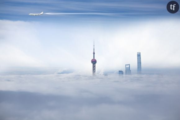 Photo d'illustration d'un avion survolant Shanghai en Chine.