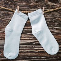 Comment fabriquer un masque avec une chaussette et sans élastiques