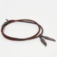  Bracelet de cheville en cuir orné de plumes 8,49 euros sur Asos 