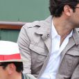 Sylvie Tellier et son compagnon Laurent aux Internationaux de France de tennis a Roland Garros a Paris le 2 juin 2013.