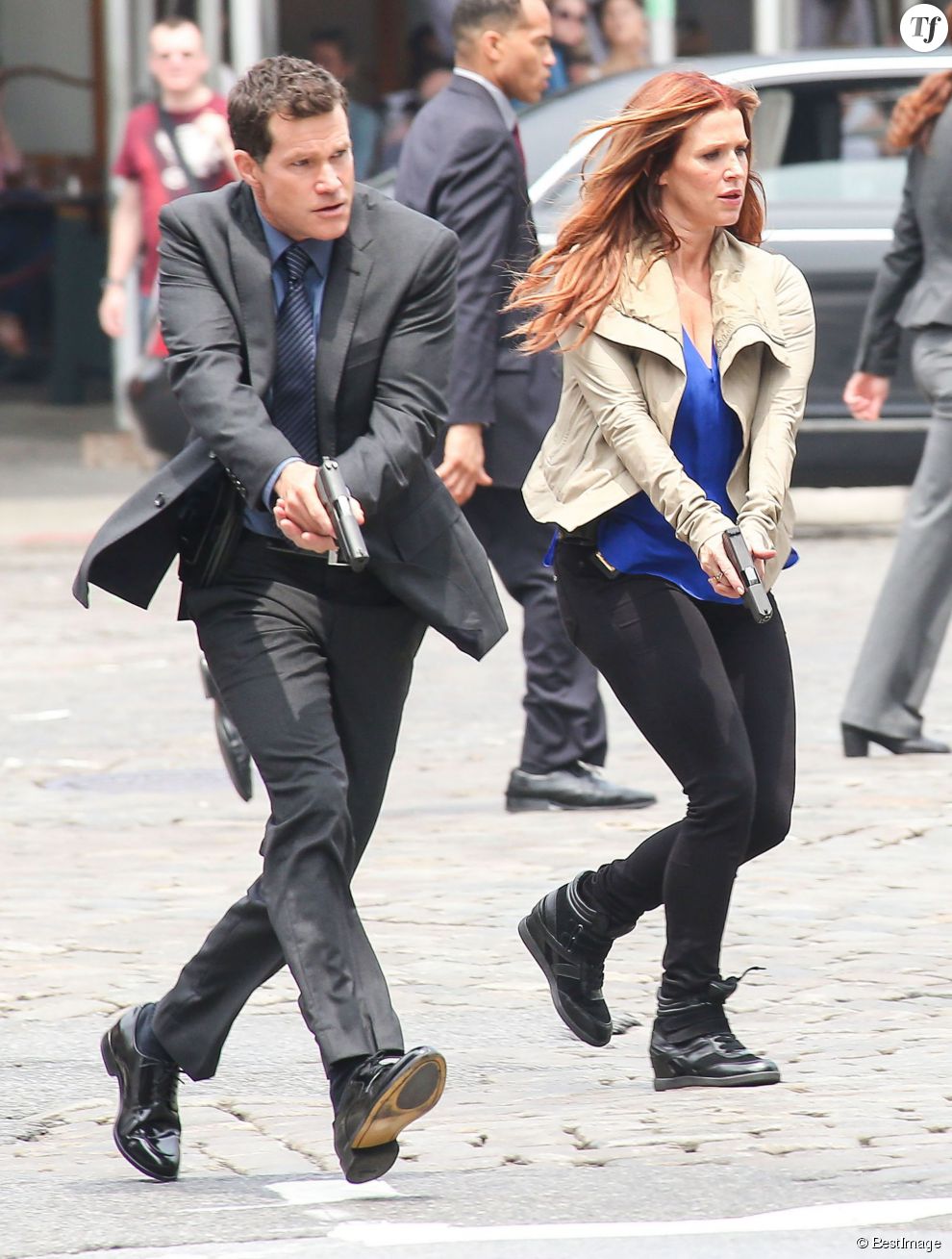  Poppy Montgomery et Dylan Walsh sur le tournage de la serie Unforgettable a New York, le 29 mai 2013.  