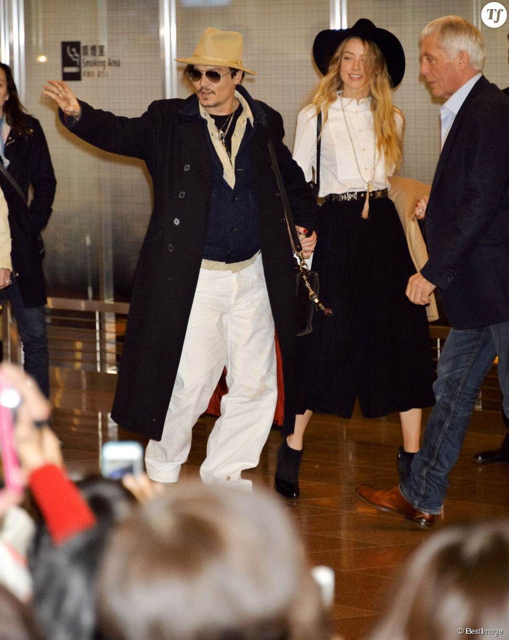  Johnny Depp et sa fiancée Amber Heard arrivent à l&#039;aéroport de Tokyo. Le 26 janvier 2015  