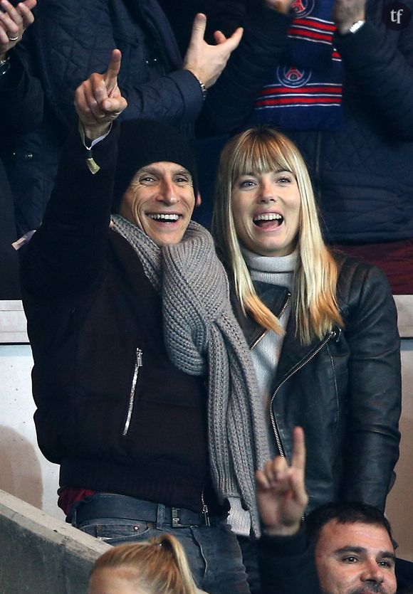 Nagui et sa femme Melanie Page - People au match de Ligue des Champions Psg - Ajax Amsterdam au Parc des Princes à Paris le 25 novembre 2014. 