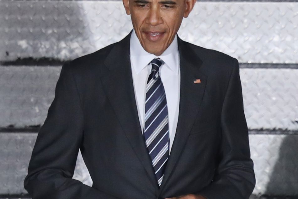 Barack Obama ne ferme que le premier bouton de sa veste