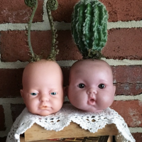 Jardinage : comment transformer de vieilles poupées en pots de