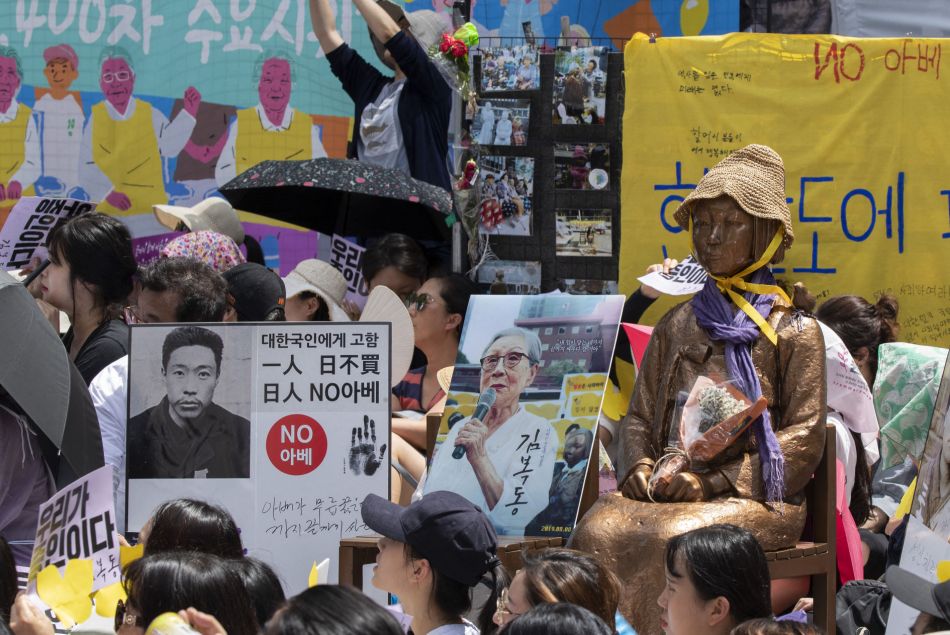 A Séoul, des manifestant·e·s exigent au Japon une compensation pour les ex-esclaves sexuelles, en août 2018.