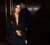 Pour ces photos en collaboration avec Chopard, Emrata a posé nue sous sa veste de costume.