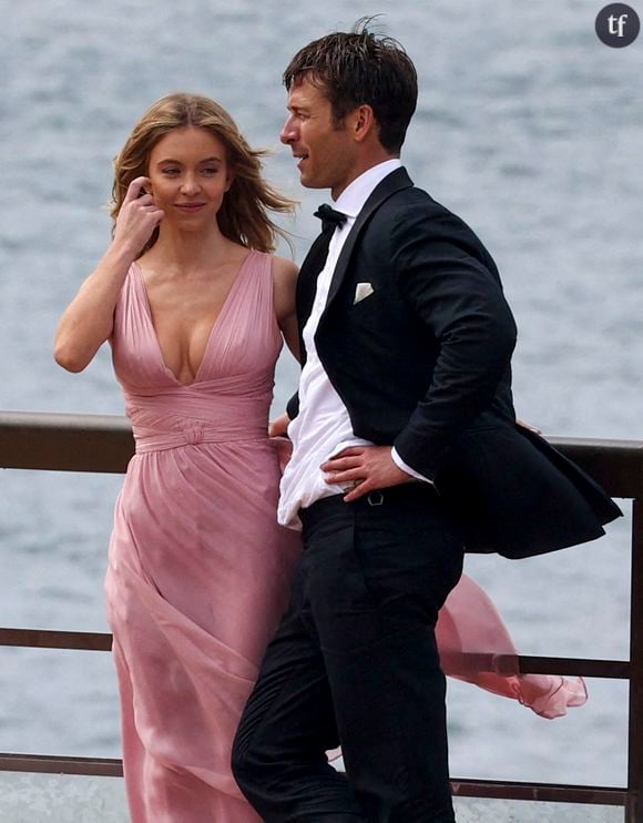 Sydney Sweeney et Glen Powell tournent leur nouvelle comédie romantique sur les marches de l'Opéra de Sydney, en Australie, le 27 mars 2023. Photo par Media Mode/Splash News/ABACAPRESS.COM